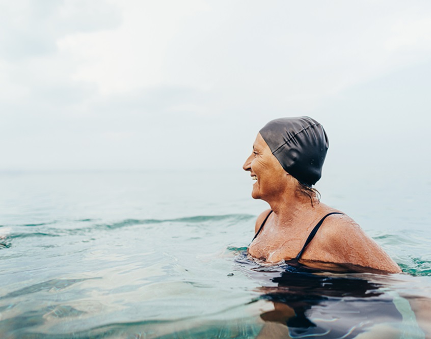 Photo of a senior female swimmer in the sea